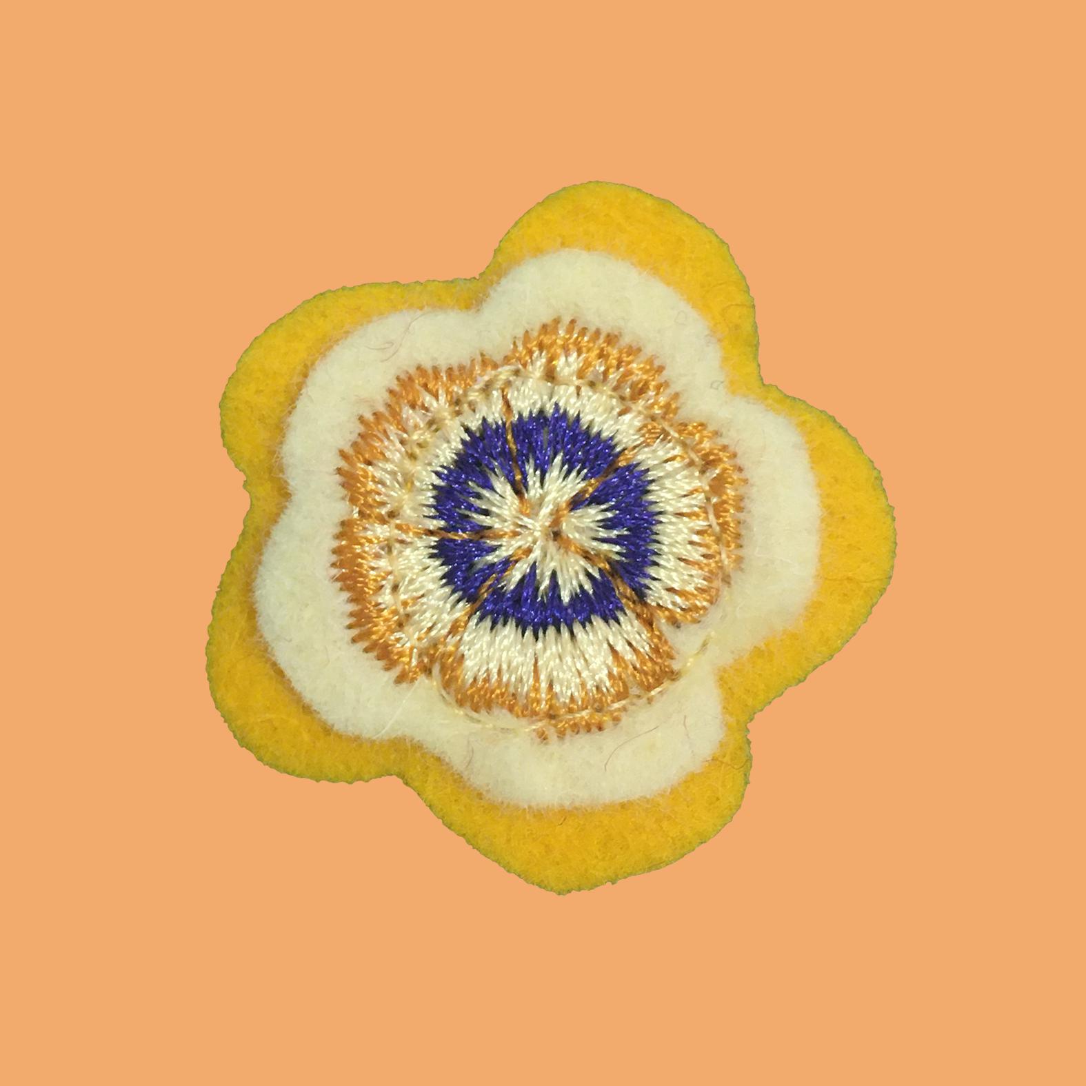 Bloem button geel